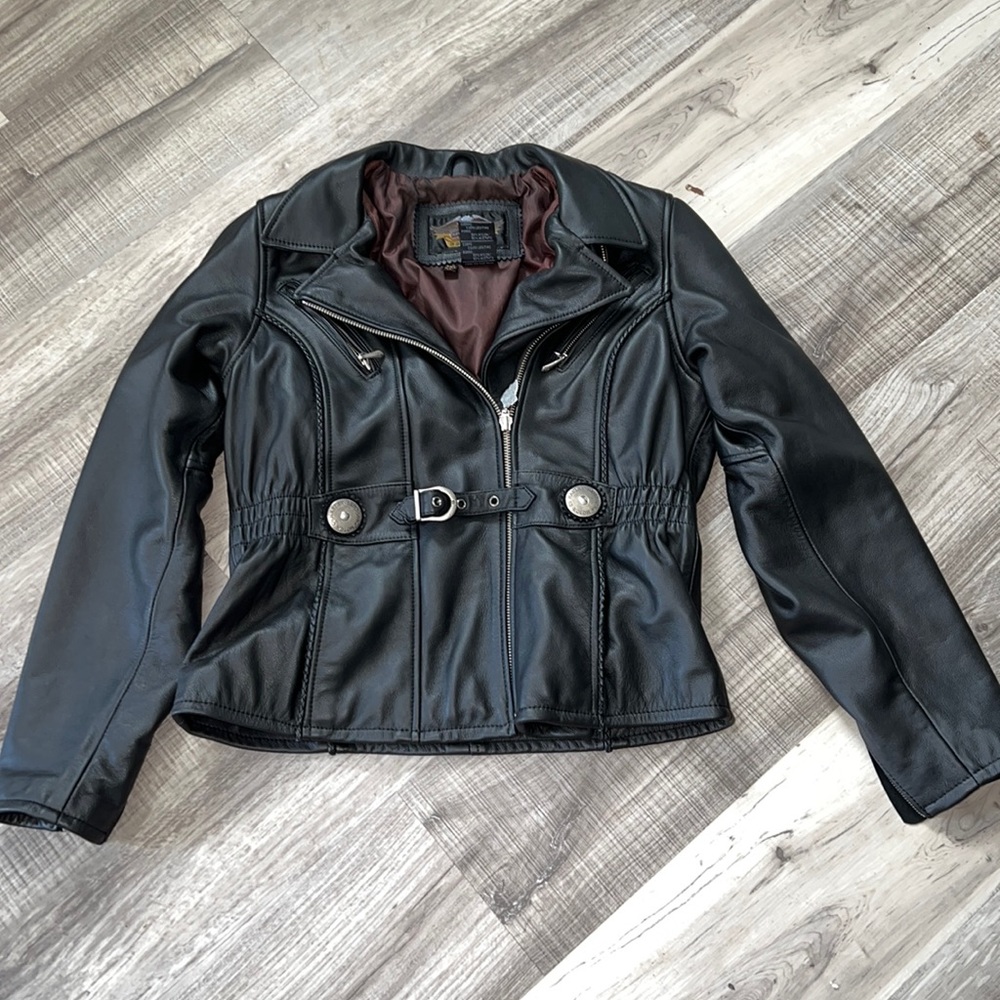 Harley Davidson leather jacket. Tag says 2XL but definitely fits as a small